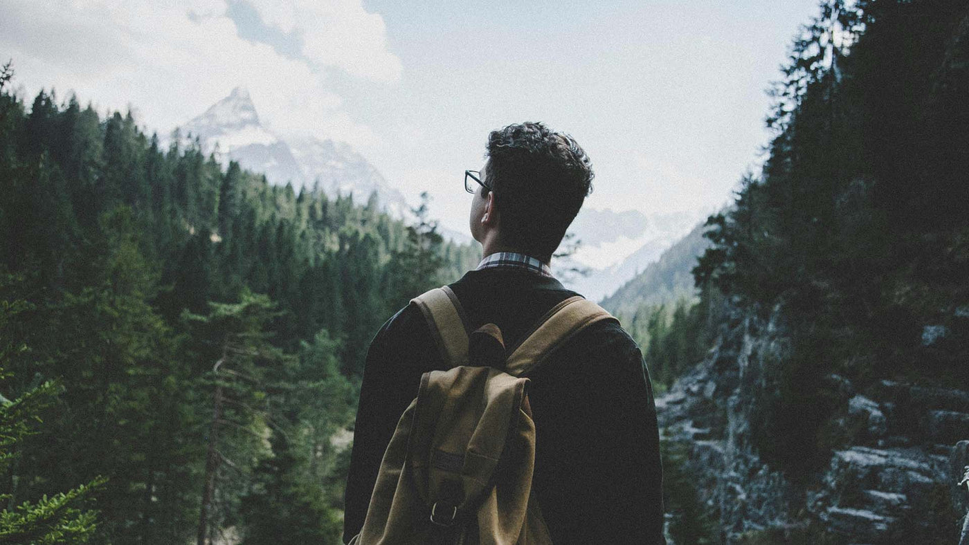 man with glasses and his backpack